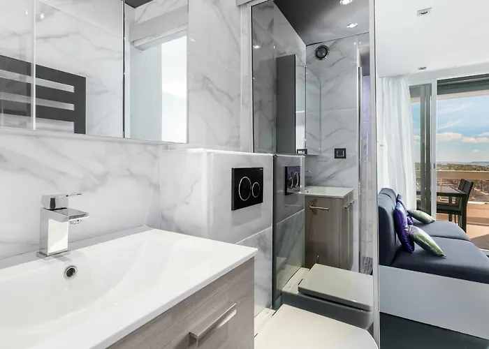 Апартаменты Village Naturiste R4n - Le Blue Light Heliopolis Sea View Luxe